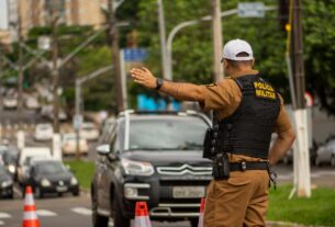 a police officer coordinating the traffic in city
