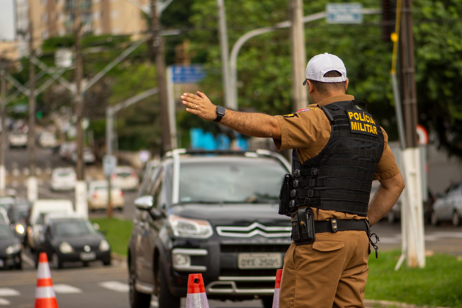 a police officer coordinating the traffic in city