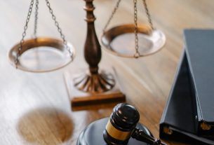 judges desk with gavel and scales