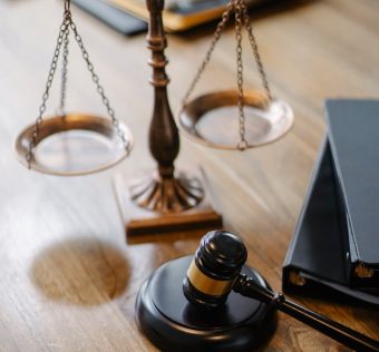 judges desk with gavel and scales